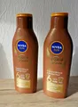Produktbild: Nivea Sun Tropical Bronze - bräunende Sonnenlotion mit Carotin  - 2 x 200ml  NEU