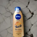 Produktbild: NIVEA Sun 🌞 Touch Body Lotion Bräunungseffekt ohne Streifen 400ml