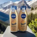 Produktbild: NIVEA Sun  Touch Body Lotion Bräunungseffekt ohne Streifen 400ml