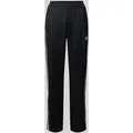 Produktbild: adidas Originals Trainingshose mit elastischem Bund und Label-Detail in Black, Größe XS