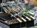 Produktbild: Schilling Fischgrilltechnik Grillguthalter Steckerlfisch Halter mit 4 Spießen, Edelstahl, Passt auf jeden Grill- oder Grillstelle mit Grillrost
