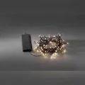 Produktbild: Konstsmide LED Lichterkette, 6h Timer, mit 8 Funktionen und Memoryfunktion, 240 warmweiße Dioden, batteriebetrieben, Außen (IP44), schwarzes Kabel
