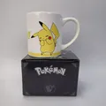 Produktbild: Pokémon Pikachu Tasse Becher Henkelbecher Keramic Mug Merchandise NEU OVP ✅️