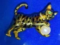 Produktbild: Cartier Brosche Tiger Watson 750 18 karat mit Zuchtperle , smaragde , Brilliante